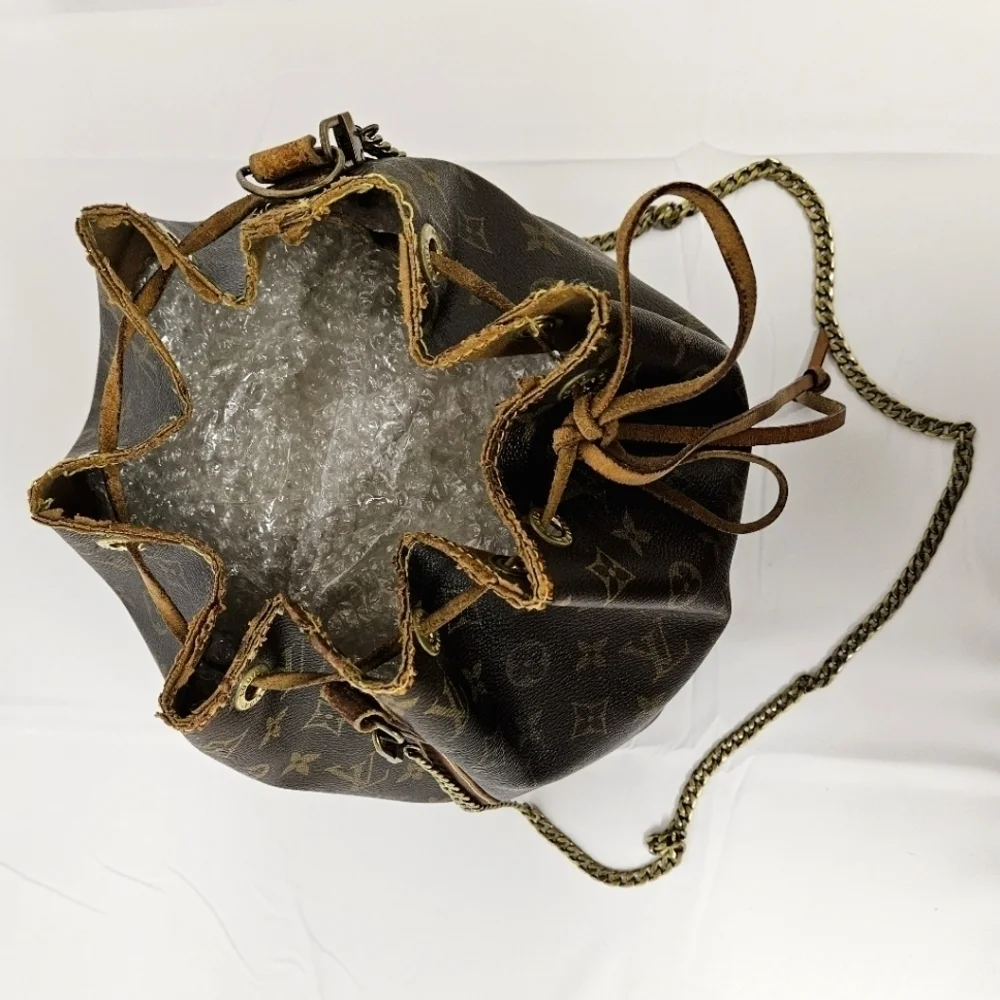 Louis Vuitton Noe Bucket Bag in Monogram Canvas and Leather